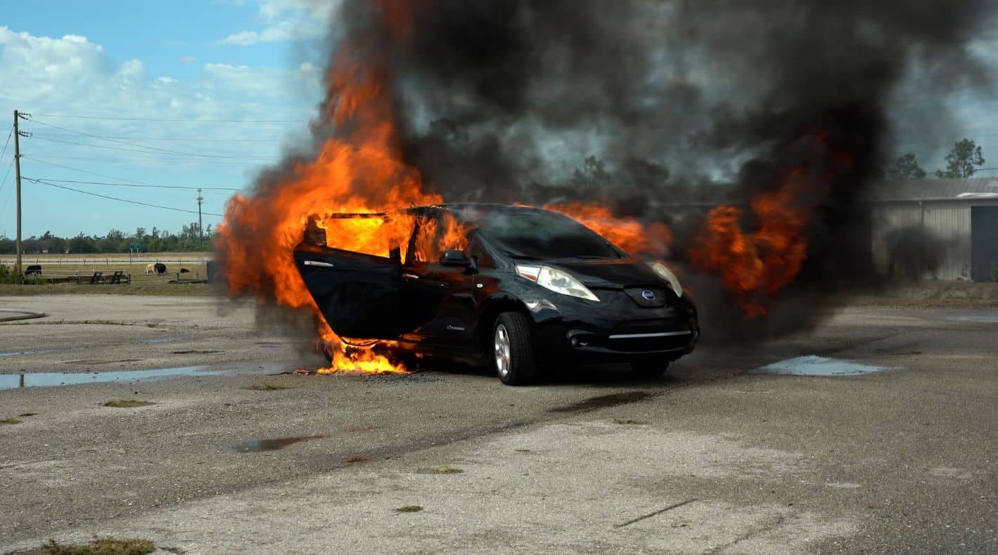 Electric vehicle fully involved in a lithium-ion battery fire