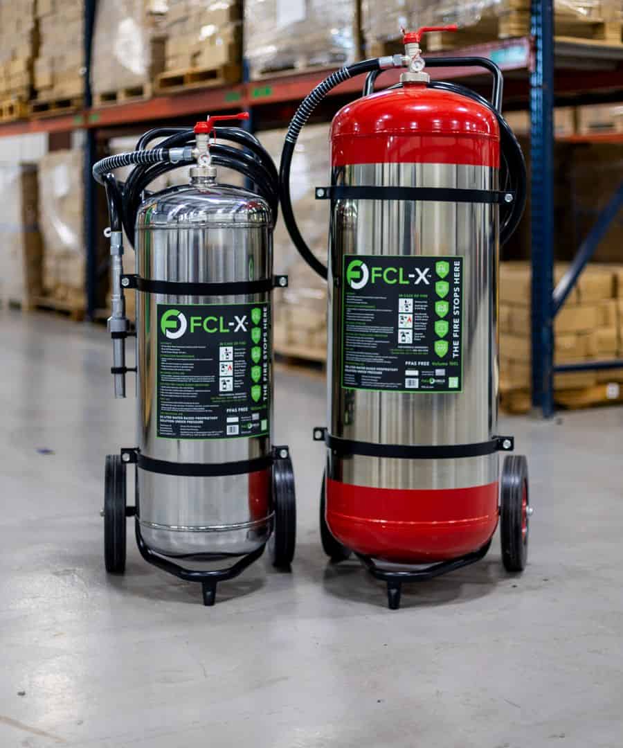 FCL-X 50 Liter and 100 Liter wheeled extinguishers in a warehouse